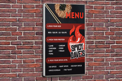 Printed SEG backlit display restaurant menu hanging on a brick wall