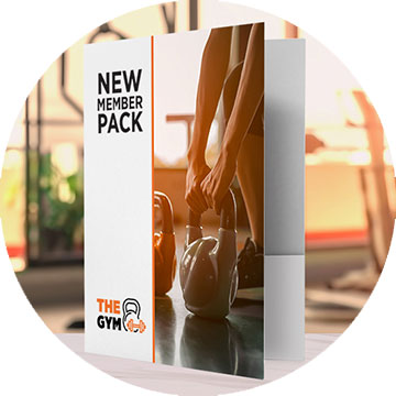 A printed pocket folder for a new member pack at a gym