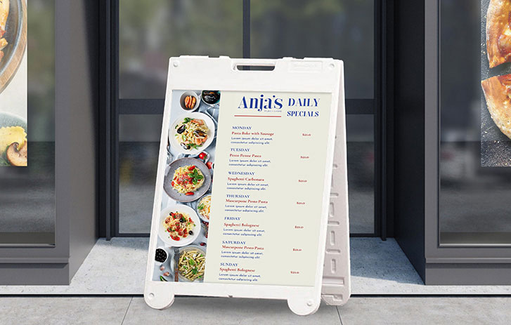 printed restaurant daily specials outdoor sign at restaurant entrance