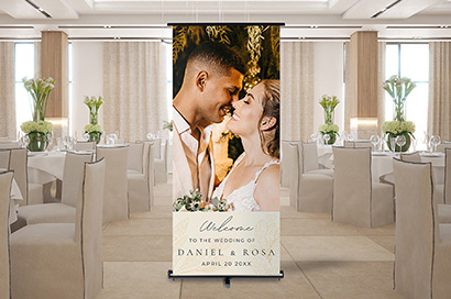 custom wedding day reception retractable banner of bride and groom in hotel banquet hall